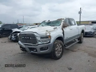 2021 Ram 2500 Laramie with VIN 3C6UR5FL7MG503085, listed as a IAAI auction lot 41937415 with 71,076 mi miles and . Bid and sale history available at DreamBid. Image 2.