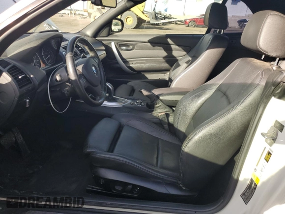 2013 BMW 1 Series 135i with VIN WBAUN7C57DVM27118, listed as a Copart auction lot 86964304 with 57,182 mi miles and Salvage Title. Bid and sale history available at carsss.com. Image 7.