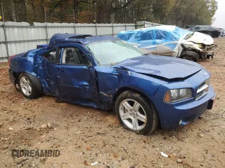 2009 Dodge Charger R/T with VIN 2B3KA53T69H557787, listed as a Copart auction lot 83871294 with 176,653 mi miles and Salvage Title. Bid and sale history available at carsss.com. Image 4.