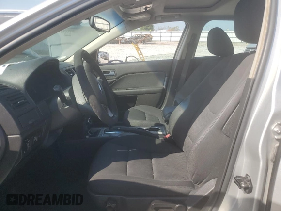 2010 Ford Fusion SE with VIN 3FAHP0HA8AR245213, listed as a Copart auction lot 62709345 with 243,651 mi miles and Salvage title. Bid and sale history available at DreamBid. Image 7.