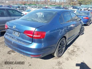 2015 Volkswagen Jetta S with VIN 3VW1K7AJ0FM353081, listed as a IAAI auction lot 41642511 with Not provided miles and . Bid and sale history available at DreamBid. Image 4.