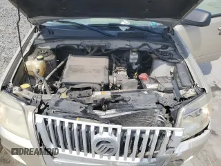 2010 Mercury Mariner z VIN 4M2CN9BG0AKJ17705, wystawiony jako Copart lot #53790315 z przebiegiem 154 832 mil mil oraz Szkody całkowita. Historia ofert i sprzedaży dostępna na DreamBid. Obrazek 12.