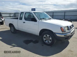 1998 Nissan Frontier XE with VIN 1N6DD26S1WC358383, listed as a Copart auction lot 48266675 with 123,105 mi miles and Salvage title. Bid and sale history available at DreamBid. Image 4.