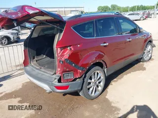 2016 Ford Escape SE z VIN 1FMCU0G79GUB36498, wystawiony jako IAAI lot #42216144 z przebiegiem 179 230 mil mil oraz . Historia ofert i sprzedaży dostępna na DreamBid. Obrazek 4.