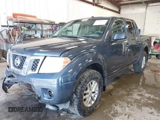 2015 Nissan Frontier Pro-4X with VIN 1N6AD0EV6FN735426, listed as a IAAI auction lot 42596253 with 183,493 mi miles and . Bid and sale history available at DreamBid. Image 2.