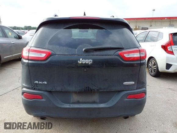 2014 Jeep Cherokee Latitude with VIN 1C4PJMCS5EW294743, listed as a IAAI auction lot 42098992 with 185,814 mi miles. Bid and sale history available at carsss.com. Image 17.