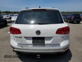 2016 Volkswagen Touareg Sport with VIN WVGEF9BPXGD010830, listed as a Copart auction lot 58663734 with 148,091 mi miles and Salvage Title. Bid and sale history available at DreamBid. Image 6.
