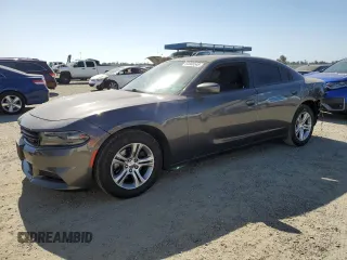 2020 Dodge Charger SXT with VIN 2C3CDXBG8LH160717, listed as a Copart auction lot 60866545 with 144,660 mi miles and Salvage title. Bid and sale history available at DreamBid. Image 1.
