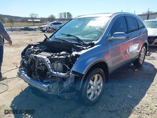 2008 Honda CR-V EX-L with VIN JHLRE38788C030498, listed as a IAAI auction lot 41761233 with 214,418 mi miles. Bid and sale history available at carsss.com. Image 18.