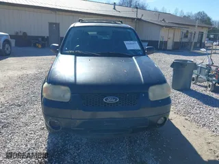 2005 Ford Escape Limited with VIN 1FMCU04155KE23314, listed as a IAAI auction lot 41685671 with 265,731 mi miles. Bid and sale history available at carsss.com. Image 12.