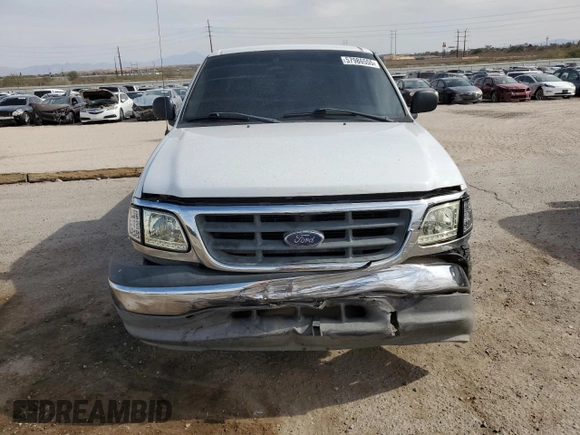 2003 Ford F-150 XL z VIN 1FTRX17233NB92067, wystawiony jako Copart lot #57986555 z przebiegiem 179 101 mil mil oraz Szkoda całkowita • Salvage title. Historia ofert i sprzedaży dostępna na DreamBid. Obrazek 5.