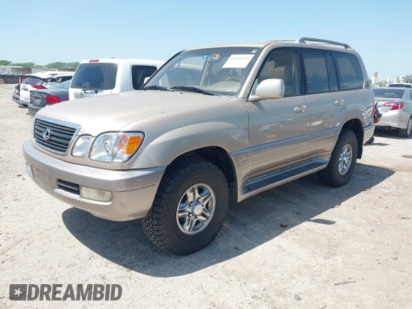 2001 Lexus LX 470 with VIN JTJHT00W613510736, listed as a IAAI auction lot 42005639 with 274,227 mi miles and . Bid and sale history available at carsss.com. Image 2.