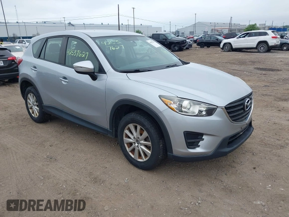 2016 Mazda CX-5 Sport z VIN JM3KE4BY1G0711602, wystawiony jako IAAI lot #42537627 z przebiegiem Nie podano mil oraz . Historia ofert i sprzedaży dostępna na DreamBid. Obrazek 1.