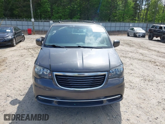 2016 Chrysler Town & Country S with VIN 2C4RC1HG4GR271360, listed as a IAAI auction lot 42114489 with 140,439 mi miles. Bid and sale history available at carsss.com. Image 12.