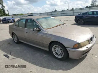 2001 BMW 5 Series 525iA with VIN WBADT43421GF57158, listed as a Copart auction lot 73212884 with 136,820 mi miles and Salvage Title. Bid and sale history available at carsss.com. Image 4.