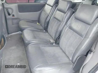 2002 Chevrolet Venture Warner Bros 1SE Pkg with VIN 1GNDX13E82D311155, listed as a IAAI auction lot 41622674 with 196,101 mi miles. Bid and sale history available at carsss.com. Image 8.