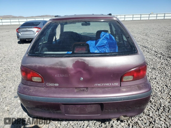 1996 Geo Metro z VIN 2C1MR2296T6778911, wystawiony jako Copart lot #50937725 z przebiegiem 157 821 mil mil oraz Szkoda całkowita • Salvage title. Historia ofert i sprzedaży dostępna na DreamBid. Obrazek 6.