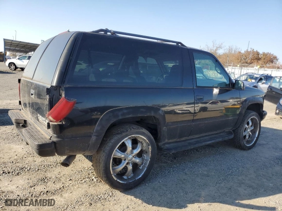 1996 Chevrolet Tahoe with VIN 3GNEK18R9TG128883, listed as a Copart auction lot 83367764 with 183,713 mi miles and Clean Title. Bid and sale history available at carsss.com. Image 3.