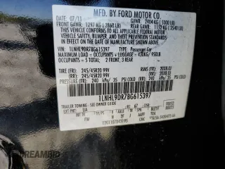 2011 Lincoln MKS with VIN 1LNHL9DR7BG615397, listed as a Copart auction lot 52047015 with 111,720 mi miles and Salvage Title. Bid and sale history available at DreamBid. Image 13.