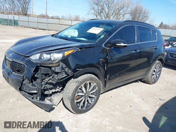 2018 Kia Sportage EX with VIN KNDPNCAC9J7324292, listed as a IAAI auction lot 41859338 with 124,519 mi miles and . Bid and sale history available at carsss.com. Image 2.