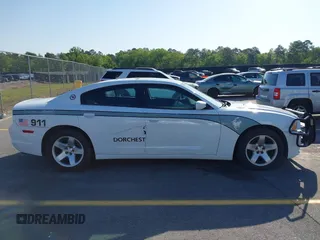2014 Dodge Charger Police with VIN 2C3CDXAT8EH348719, listed as a IAAI auction lot 42026437 with 140,573 mi miles and . Bid and sale history available at DreamBid. Image 13.