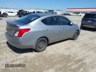 2012 Nissan Versa S with VIN 3N1CN7APXCL868911, listed as a IAAI auction lot 41762670 with 228,177 mi miles. Bid and sale history available at carsss.com. Image 4.