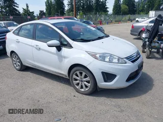 2011 Ford Fiesta SE z VIN 3FADP4BJ8BM229106, wystawiony jako IAAI lot #42487103 z przebiegiem 118 707 mil mil oraz . Historia ofert i sprzedaży dostępna na DreamBid. Obrazek 1.