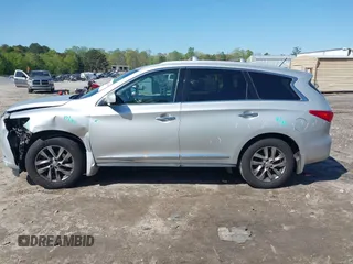 2015 Infiniti QX60 z VIN 5N1AL0MM2FC507641, wystawiony jako IAAI lot #42005398 z przebiegiem 168 315 mil mil oraz . Historia ofert i sprzedaży dostępna na DreamBid. Obrazek 14.