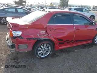 2009 Toyota Corolla with VIN 1NXBU40EX9Z027482, listed as a IAAI auction lot 42149978 with 164,318 mi miles. Bid and sale history available at carsss.com. Image 6.