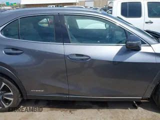 2021 Lexus UX 250h with VIN JTHP9JBH1M2040593, listed as a IAAI auction lot 42024493 with 33,394 mi miles and . Bid and sale history available at DreamBid. Image 14.