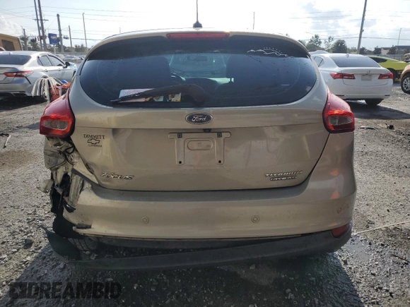 2016 Ford Focus Titanium with VIN 1FADP3N24GL302625, listed as a Copart auction lot 59180675 with 97,401 mi miles and Salvage title. Bid and sale history available at DreamBid. Image 6.