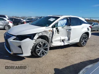 2018 Lexus RX 350 z VIN 2T2ZZMCAXJC106256, wystawiony jako IAAI lot #41658817 z przebiegiem 103 733 mil mil oraz . Historia ofert i sprzedaży dostępna na DreamBid. Obrazek 16.
