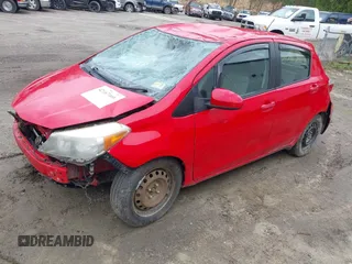2012 Toyota Yaris L with VIN JTDKTUD32CD513940, listed as a IAAI auction lot 42167466 with 108,407 mi miles and . Bid and sale history available at DreamBid. Image 2.