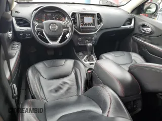 2014 Jeep Cherokee Trailhawk с VIN 1C4PJMBB6EW130595, выставлен на аукционе Copart как лот 58470065 с пробегом 131 303 миль миль и Списание • Salvage title. История ставок и продаж доступна на DreamBid. Изображение 8.
