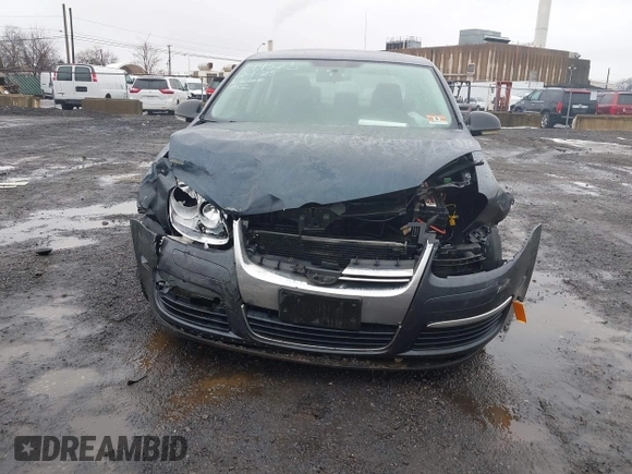 2009 Volkswagen Jetta SE z VIN 3VWRZ71K49M016683, wystawiony jako IAAI lot #41530644 z przebiegiem 106 148 mil mil oraz . Historia ofert i sprzedaży dostępna na DreamBid. Obrazek 6.