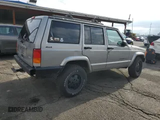 2000 Jeep Cherokee with VIN 1J4FF48S5YL172583, listed as a Copart auction lot 59605745 with 258,409 mi miles and Salvage title. Bid and sale history available at DreamBid. Image 3.