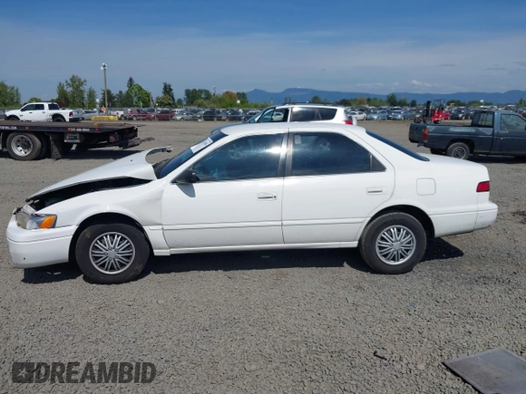 1999 Toyota Camry LE z VIN 4T1BG22K0XU862535, wystawiony jako IAAI lot #42116856 z przebiegiem 186 094 mil mil oraz . Historia ofert i sprzedaży dostępna na DreamBid. Obrazek 15.