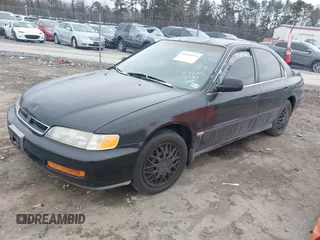 1996 Honda Accord LX with VIN 1HGCD5639TA040206, listed as a IAAI auction lot 41369374 with 233,232 mi miles and . Bid and sale history available at carsss.com. Image 2.
