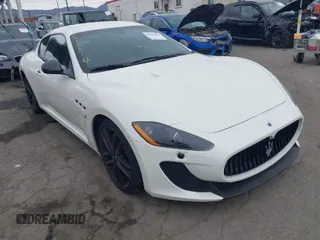 2012 Maserati GranTurismo MC Stradale with VIN ZAM45MLA9C0065671, listed as a IAAI auction lot 40990883 with 27,041 mi miles. Bid and sale history available at carsss.com. Image 1.