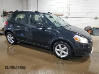 2009 Suzuki SX4 Touring AWD with VIN JS2YB417496202243, listed as a Copart auction lot 53842055 with 70,544 mi miles and Salvage Title. Bid and sale history available at DreamBid. Image 4.