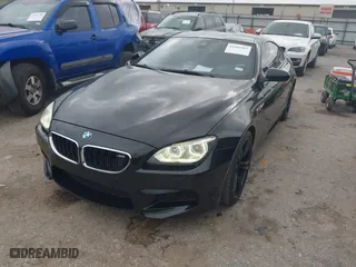 2013 BMW M6 with VIN WBSLX9C50DC968777, listed as a IAAI auction lot 41966918 with 113,458 mi miles. Bid and sale history available at carsss.com. Image 17.