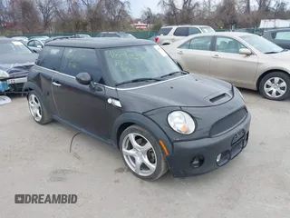 2013 MINI Hardtop S z VIN WMWSV3C51DT393480, wystawiony jako IAAI lot #41875837 z przebiegiem 117 157 mil mil oraz . Historia ofert i sprzedaży dostępna na DreamBid. Obrazek 1.