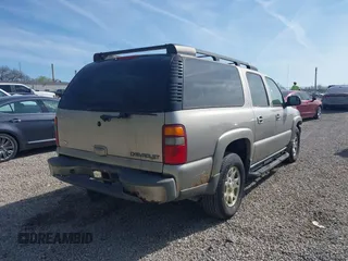 2003 Chevrolet Suburban Z71 with VIN 3GNFK16Z73G190936, listed as a IAAI auction lot 42078452 with 231,121 mi miles. Bid and sale history available at carsss.com. Image 4.
