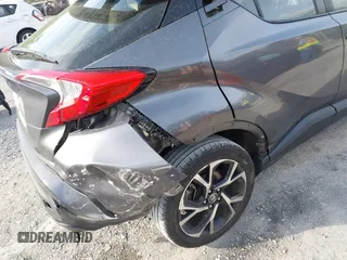2019 Toyota C-HR XLE z VIN JTNKHMBX0K1013522, wystawiony jako IAAI lot #42053511 z przebiegiem 136 330 mil mil oraz . Historia ofert i sprzedaży dostępna na DreamBid. Obrazek 17.