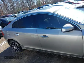 2016 Volvo S60 T5 Premier z VIN LYV612TK2GB099241, wystawiony jako IAAI lot #41808950 z przebiegiem 153 693 mil mil oraz . Historia ofert i sprzedaży dostępna na DreamBid. Obrazek 14.