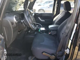 2015 Jeep Wrangler Unlimited Sahara with VIN 1C4BJWEG3FL530114, listed as a Copart auction lot 88851565 with 156,669 mi miles and Salvage Title. Bid and sale history available at carsss.com. Image 7.