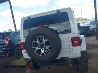 2022 Jeep Wrangler Unlimited Rubicon z VIN 1C4JJXFM6NW234295, wystawiony jako IAAI lot #41906475 z przebiegiem 47 546 mil mil oraz . Historia ofert i sprzedaży dostępna na DreamBid. Obrazek 17.