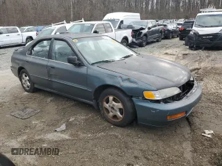1996 Honda Accord EX with VIN 1HGCD5655TA028555, listed as a Copart auction lot 46263005 with 186,377 mi miles and Salvage Title. Bid and sale history available at DreamBid. Image 4.