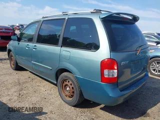 2001 Mazda MPV DX with VIN JM3LW28G610200849, listed as a IAAI auction lot 41974490 with 228,914 mi miles. Bid and sale history available at carsss.com. Image 3.
