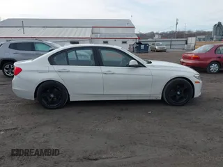 2013 BMW 3 Series 328i xDrive with VIN WBA3B5G5XDNS02162, listed as a IAAI auction lot 41484578 with 132,211 mi miles. Bid and sale history available at carsss.com. Image 13.